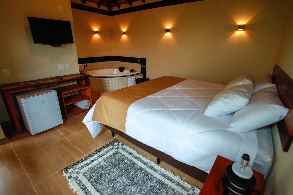 Suite con bañera de hidromasaje - Cama extragrande